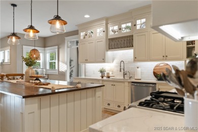 This fully remodeled home offers the perfect blend of privacy on Osage National Golf Club in Missouri - for sale on GolfHomes.com, golf home, golf lot