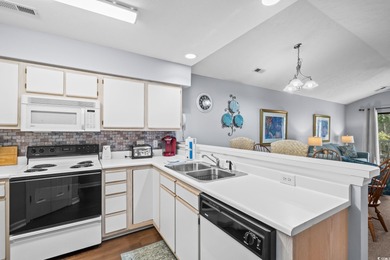 Experience coastal living at its finest in this beautiful on True Blue Plantation in South Carolina - for sale on GolfHomes.com, golf home, golf lot