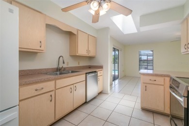 CHARMING 2 Bedroom, 2 Bathroom, 2 Car Garage, Pool home with a on Deep Creek Golf Club in Florida - for sale on GolfHomes.com, golf home, golf lot