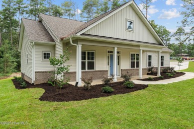 MOVE-IN READY! Purchase now and choose between a BRAND NEW Toro on Foxfire Golf and Country Club in North Carolina - for sale on GolfHomes.com, golf home, golf lot