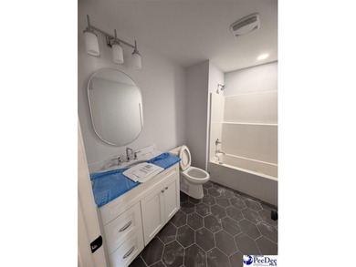 Step into timeless elegance with this new construction home by on The Traces Golf Club in South Carolina - for sale on GolfHomes.com, golf home, golf lot