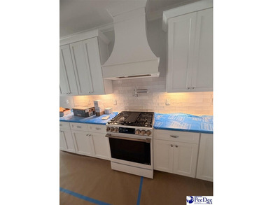 Step into timeless elegance with this new construction home by on The Traces Golf Club in South Carolina - for sale on GolfHomes.com, golf home, golf lot