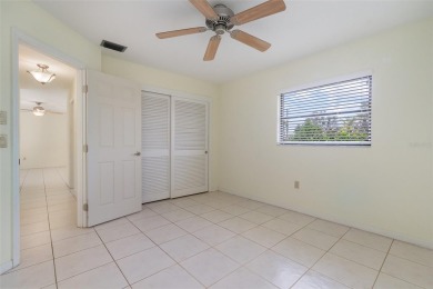 CHARMING 2 Bedroom, 2 Bathroom, 2 Car Garage, Pool home with a on Deep Creek Golf Club in Florida - for sale on GolfHomes.com, golf home, golf lot