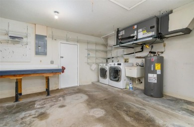CHARMING 2 Bedroom, 2 Bathroom, 2 Car Garage, Pool home with a on Deep Creek Golf Club in Florida - for sale on GolfHomes.com, golf home, golf lot