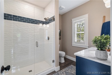 This fully remodeled home offers the perfect blend of privacy on Osage National Golf Club in Missouri - for sale on GolfHomes.com, golf home, golf lot