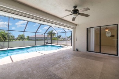 CHARMING 2 Bedroom, 2 Bathroom, 2 Car Garage, Pool home with a on Deep Creek Golf Club in Florida - for sale on GolfHomes.com, golf home, golf lot