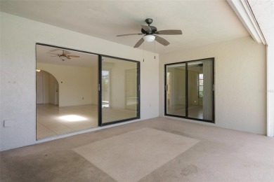 CHARMING 2 Bedroom, 2 Bathroom, 2 Car Garage, Pool home with a on Deep Creek Golf Club in Florida - for sale on GolfHomes.com, golf home, golf lot