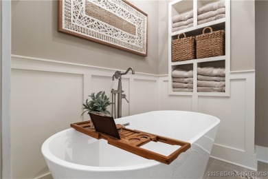 This fully remodeled home offers the perfect blend of privacy on Osage National Golf Club in Missouri - for sale on GolfHomes.com, golf home, golf lot