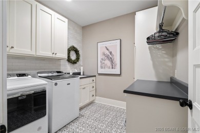 This fully remodeled home offers the perfect blend of privacy on Osage National Golf Club in Missouri - for sale on GolfHomes.com, golf home, golf lot