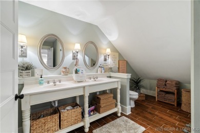 This fully remodeled home offers the perfect blend of privacy on Osage National Golf Club in Missouri - for sale on GolfHomes.com, golf home, golf lot