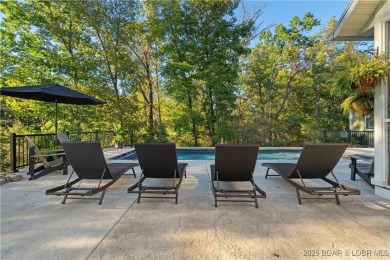 This fully remodeled home offers the perfect blend of privacy on Osage National Golf Club in Missouri - for sale on GolfHomes.com, golf home, golf lot