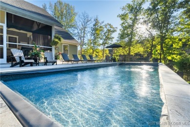 This fully remodeled home offers the perfect blend of privacy on Osage National Golf Club in Missouri - for sale on GolfHomes.com, golf home, golf lot
