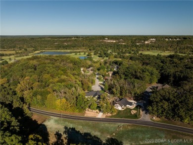 This fully remodeled home offers the perfect blend of privacy on Osage National Golf Club in Missouri - for sale on GolfHomes.com, golf home, golf lot