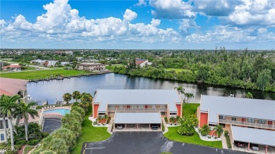 Waterfront Retreat with Boat Slip! Welcome to the ease of on Saint Andrews South Golf Club in Florida - for sale on GolfHomes.com, golf home, golf lot