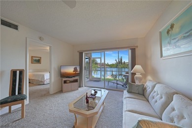 Waterfront Retreat with Boat Slip! Welcome to the ease of on Saint Andrews South Golf Club in Florida - for sale on GolfHomes.com, golf home, golf lot