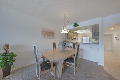 Waterfront Retreat with Boat Slip! Welcome to the ease of on Saint Andrews South Golf Club in Florida - for sale on GolfHomes.com, golf home, golf lot