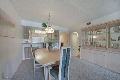 Waterfront Retreat with Boat Slip! Welcome to the ease of on Saint Andrews South Golf Club in Florida - for sale on GolfHomes.com, golf home, golf lot