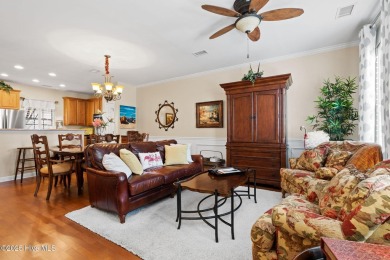 Discover the perfect blend of comfort and convenience in this on Sea Trail Golf Resort in North Carolina - for sale on GolfHomes.com, golf home, golf lot