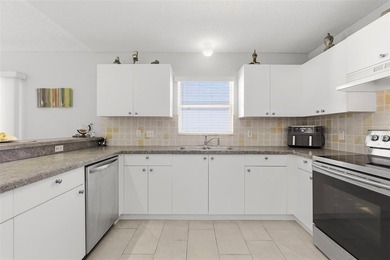 Golf Frontage Las Brisas Courtyard Villa | Tastefully TURNKEY  | on El Diablo Executive Golf Course in Florida - for sale on GolfHomes.com, golf home, golf lot