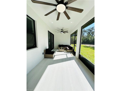 Experience the best of Golden Gate Estates living in this on The Club At Twin Eagles in Florida - for sale on GolfHomes.com, golf home, golf lot