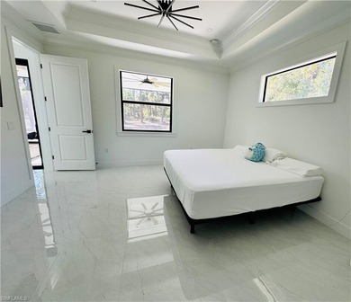 Experience the best of Golden Gate Estates living in this on The Club At Twin Eagles in Florida - for sale on GolfHomes.com, golf home, golf lot