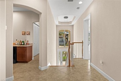 Experience spectacular, sweeping lake views from this on Lely Resort Golf and Country Club in Florida - for sale on GolfHomes.com, golf home, golf lot