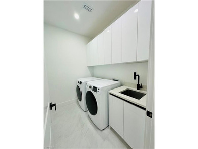 Experience the best of Golden Gate Estates living in this on The Club At Twin Eagles in Florida - for sale on GolfHomes.com, golf home, golf lot