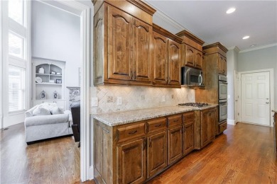 Discover this exceptional executive home situated on a serene 1 on Trophy Club of Apalachee in Georgia - for sale on GolfHomes.com, golf home, golf lot