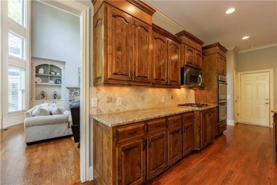 Discover this exceptional executive home situated on a serene 1 on Trophy Club of Apalachee in Georgia - for sale on GolfHomes.com, golf home, golf lot