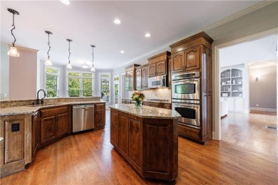 Discover this exceptional executive home situated on a serene 1 on Trophy Club of Apalachee in Georgia - for sale on GolfHomes.com, golf home, golf lot