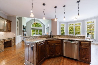 Discover this exceptional executive home situated on a serene 1 on Trophy Club of Apalachee in Georgia - for sale on GolfHomes.com, golf home, golf lot
