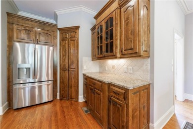 Discover this exceptional executive home situated on a serene 1 on Trophy Club of Apalachee in Georgia - for sale on GolfHomes.com, golf home, golf lot
