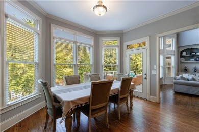 Discover this exceptional executive home situated on a serene 1 on Trophy Club of Apalachee in Georgia - for sale on GolfHomes.com, golf home, golf lot