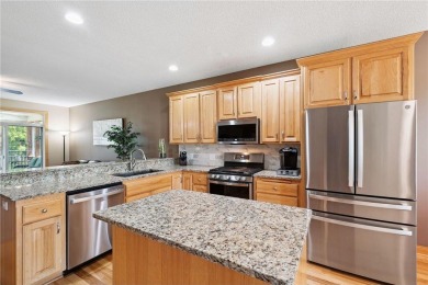 This former model home is privately situated at the end of the on Riverwood National in Minnesota - for sale on GolfHomes.com, golf home, golf lot