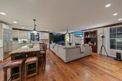 Welcome to this stunning Santaluz former model home, lovingly on The Santaluz Club in California - for sale on GolfHomes.com, golf home, golf lot
