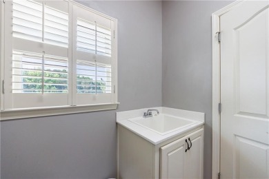Discover this exceptional executive home situated on a serene 1 on Trophy Club of Apalachee in Georgia - for sale on GolfHomes.com, golf home, golf lot