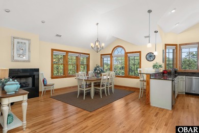 This 5-bedroom, 6.5-bath residence offers over 3,600 square feet on The Currituck Golf Club in North Carolina - for sale on GolfHomes.com, golf home, golf lot