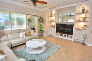 This Bermuda with it's inviting front porch and open-kitchen on The Florida Club in Florida - for sale on GolfHomes.com, golf home, golf lot