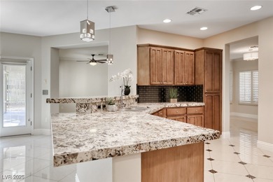 Highly upgraded single-story home nestled in one of Henderson's on Revere Golf Club in Nevada - for sale on GolfHomes.com, golf home, golf lot