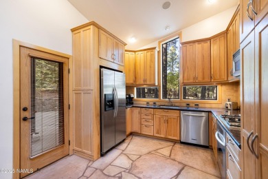 Discover a one-of-a-kind custom residence overlooking Aspen on Aspen Valley Golf Club in Arizona - for sale on GolfHomes.com, golf home, golf lot
