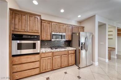 Highly upgraded single-story home nestled in one of Henderson's on Revere Golf Club in Nevada - for sale on GolfHomes.com, golf home, golf lot