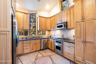 Discover a one-of-a-kind custom residence overlooking Aspen on Aspen Valley Golf Club in Arizona - for sale on GolfHomes.com, golf home, golf lot