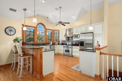 This 5-bedroom, 6.5-bath residence offers over 3,600 square feet on The Currituck Golf Club in North Carolina - for sale on GolfHomes.com, golf home, golf lot
