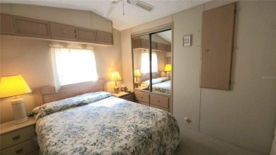 TWO BED, ONE BATH HOME IN ACTIVE 55+ COMMUNITY! This furnished on River Run Golf Links in Florida - for sale on GolfHomes.com, golf home, golf lot