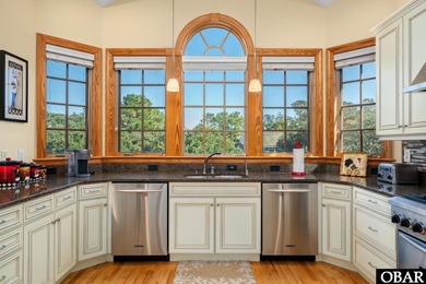 This 5-bedroom, 6.5-bath residence offers over 3,600 square feet on The Currituck Golf Club in North Carolina - for sale on GolfHomes.com, golf home, golf lot