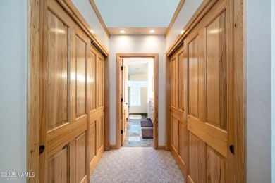 Discover a one-of-a-kind custom residence overlooking Aspen on Aspen Valley Golf Club in Arizona - for sale on GolfHomes.com, golf home, golf lot