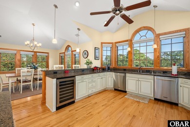 This 5-bedroom, 6.5-bath residence offers over 3,600 square feet on The Currituck Golf Club in North Carolina - for sale on GolfHomes.com, golf home, golf lot