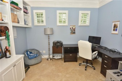 This Bermuda with it's inviting front porch and open-kitchen on The Florida Club in Florida - for sale on GolfHomes.com, golf home, golf lot