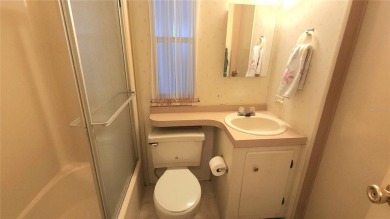 TWO BED, ONE BATH HOME IN ACTIVE 55+ COMMUNITY! This furnished on River Run Golf Links in Florida - for sale on GolfHomes.com, golf home, golf lot