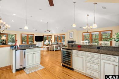 This 5-bedroom, 6.5-bath residence offers over 3,600 square feet on The Currituck Golf Club in North Carolina - for sale on GolfHomes.com, golf home, golf lot